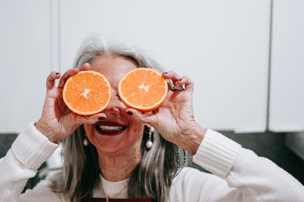 wellness over 50 requires laughter honey good holding oranges