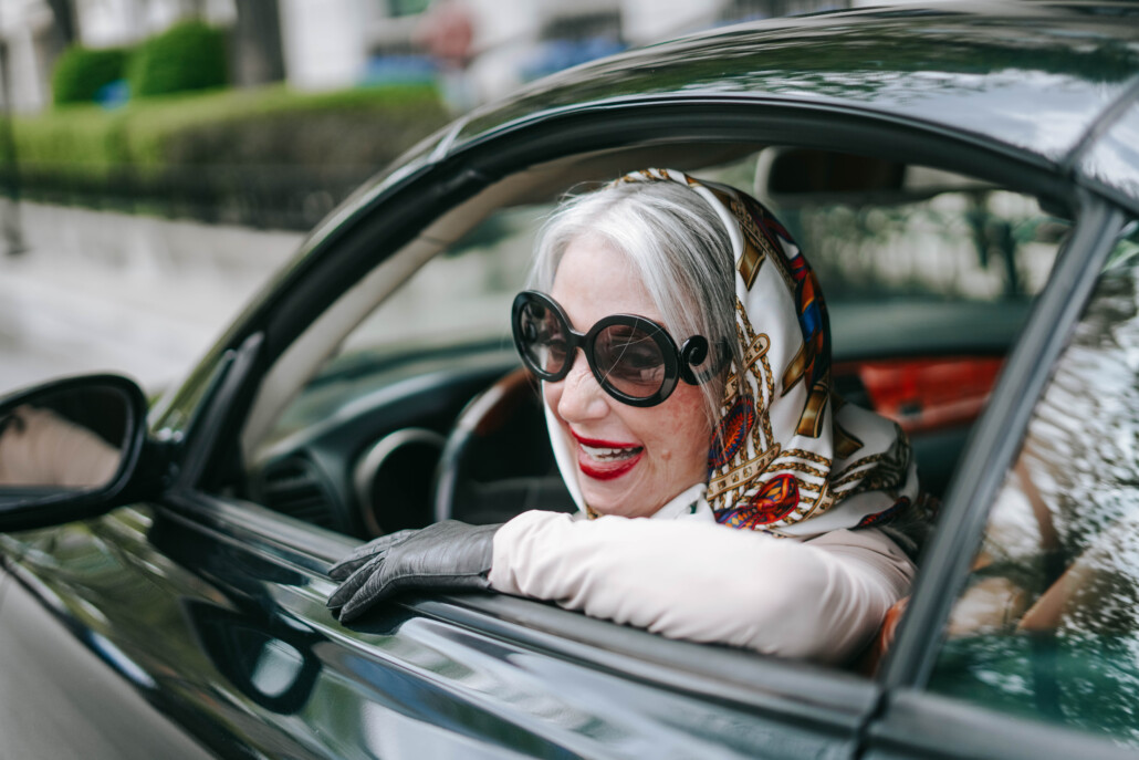 celebrating visibility honey good in sunglasses in car